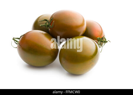 dark tomatoes on white background Stock Photo