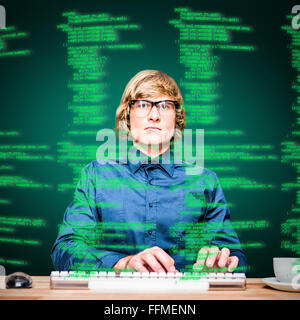 Composite image of focused hipster businessman using computer Stock Photo