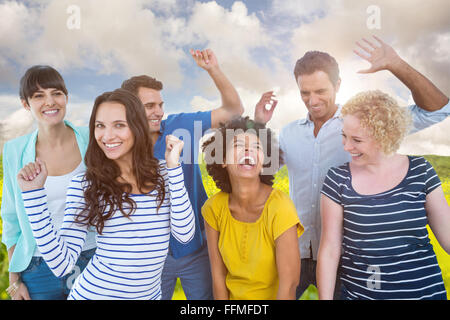 Composite image of creative business team having fun Stock Photo