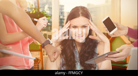 Composite image of woman with head in hands Stock Photo