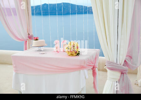 Pink decorations for wedding ceremony on the beach Stock Photo