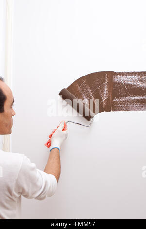 Man painting new house Stock Photo