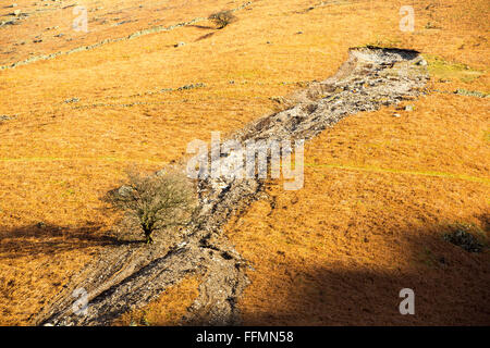 Storm Desmond wreaked havoc across Cumbria with floods and destruction. The super saturated ground failed in many places leaving landslip scars on many of the fellsides, this one is on Stone Arthur above Grasmere, Lake District, UK. Stock Photo