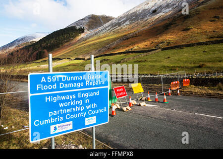 Storm Desmond wreaked havoc across Cumbria with floods and destruction. The A591, the main road between Ambleside and Keswick was sliced in two, as large parts of the road were swept away. It is likely to be six months at least before the road is open. Stock Photo