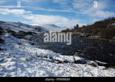 A quarry stands by the River Tees at Upper Teesdale in County Durham, England. The river flows by the Pennine Way. Stock Photo