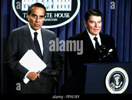 Washington, District of Columbia, USA. 17th Dec, 1987. United States President Ronald Reagan, right, makes a statement to announce the support of U.S. Senate Republican Leader Bob Dole (Republican of Kansas), left, for the passage of the Intermediate-Range Nuclear Forces Treaty (INF) Treaty recently signed with the Soviet Union, in the White House Press Briefing Room in Washington, DC on December 17, 1987.Credit: Arnie Sachs/CNP © Arnie Sachs/CNP/ZUMA Wire/Alamy Live News Stock Photo