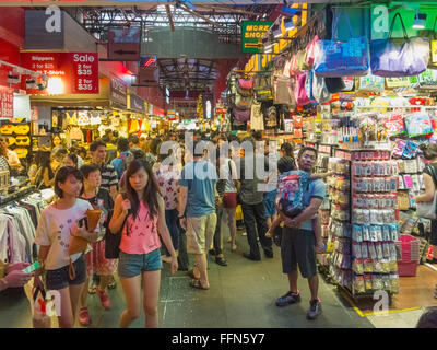 Kuala Lumpur - The famous Bugis Street Market in Kuala Lumpur, Malaysia with people shopping at the market stalls Stock Photo