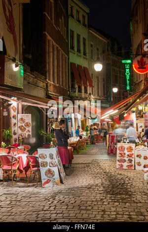 Belgium, Brussels - Rue des Bouchers, restaurants line the streets in Brussels city, Belgium, Europe at night Stock Photo