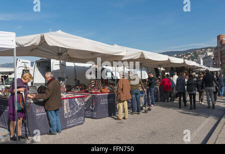 Sunday Trieste market stalls on the waterfront in Trieste, Italy, Europe Stock Photo