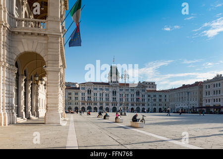 Trieste Italy, tourists in Piazza Unità d'Italia, the main square in Trieste, Italy, Europe Stock Photo