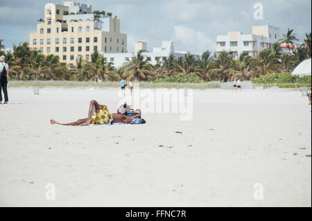 Miami Beach, Florida - People relaxing on the main beach, April Stock Photo