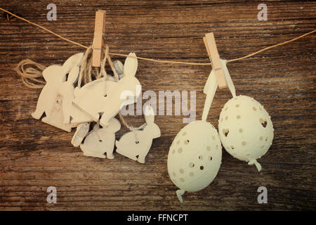 hanging easter eggs and rabbits Stock Photo