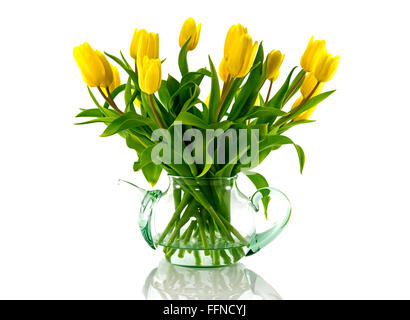 vase with bouquet of yellow tulips as icon for spring in holland Stock Photo