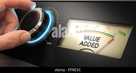 Hand turning a knob up to the maximum with a dial where it is written the text value added. Concept image for illustration of co Stock Photo