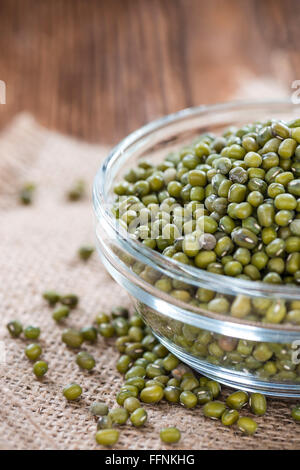 Dried Mung Beans (detailed close-up shot) on vintage wooden background Stock Photo