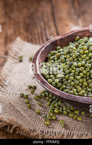 Dried Mung Beans (detailed close-up shot) on vintage wooden background Stock Photo