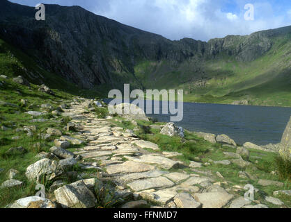 Cwm Idwal and Llyn Idwal lake with stone path up to Devil's Kitchen and Glyder fawr Glyderau Glyders Snowdonia National Park Gwy Stock Photo