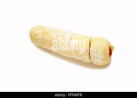 Raw Pretzel Dog Ready for the Oven Isolated on White Stock Photo