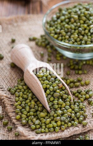 Dried Mung Beans (detailed close-up shot) on vintage wooden background Stock Photo