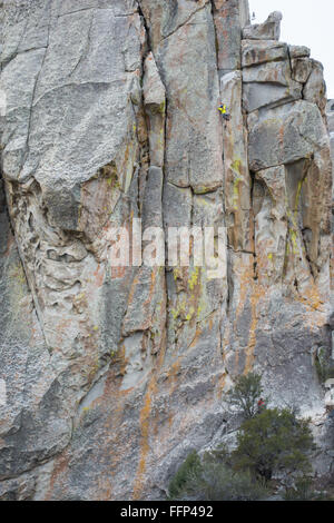 Elijah Weber climbs a route called Thin Slice at the City of Rocks Stock Photo