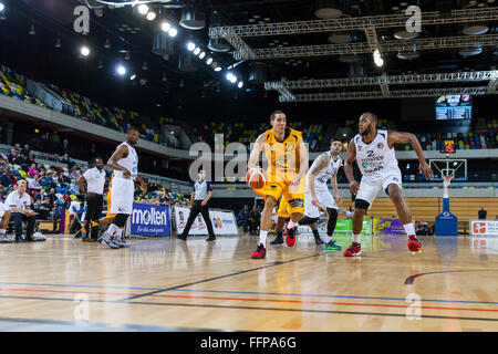 London, UK. 16th February 2016. Lions' Kai Williams (23) drives the ball forward past Wolves' Perris Blackwell (2) during the London Lions vs. Worcester Wolves BBL game at the Copper Box Arena in the Olympic Park. London Lions win 80-71 Credit:  Imageplotter News and Sports/Alamy Live News Stock Photo