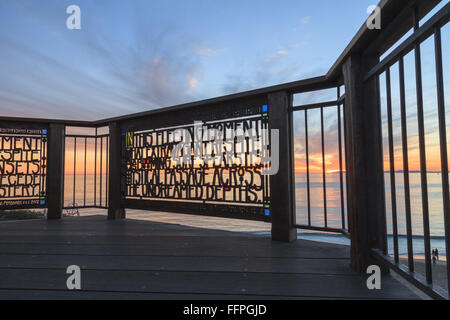 Stained glass fence at Browns Park in Laguna Beach, California at sunset. Stock Photo