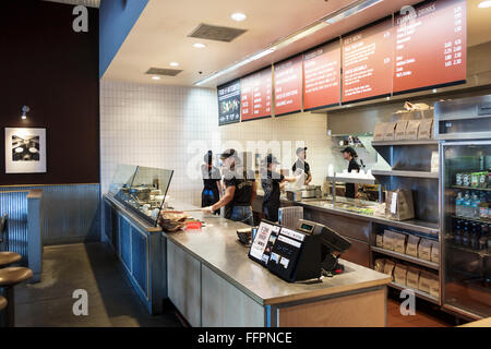 Florida South,Port St. Saint Lucie,Chipotle,restaurant restaurants food dining cafe cafes,Mexican,food,interior inside,counter,employees,FL151209002 Stock Photo