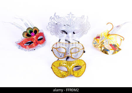 group of masks placed on a white background Stock Photo