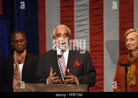 New York City, United States. 16th Feb, 2016. Congressional representative for Harlem, Charlie Rangel, speaks while Chirlane McCray and Hillary Clinton listen on stage. Presidential candidate and former secretary of state Hillary Rodham Clinton spoke at Shomburg Center on her plans for strengthening the Black community and improving opportunity for minorities if elected president Credit:  Andy Katz/Pacific Press/Alamy Live News Stock Photo