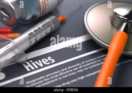 Hives - Printed Diagnosis on Grey Background. Stock Photo