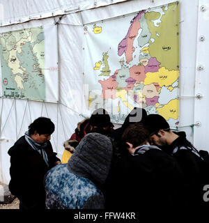 Migrants on Chios Island -  03/01/2016  -  Greece / Cyclades (the) / Chios island  -  Refugees gathered in front of the UNHCR te Stock Photo