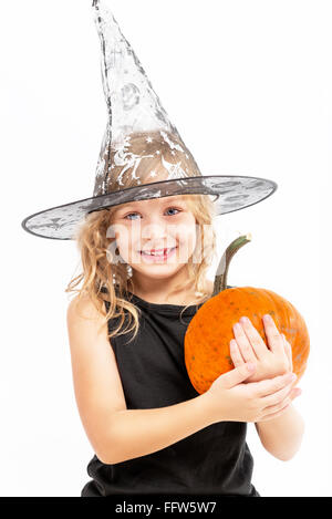 Portrait of a pretty little girl in witch costume Stock Photo