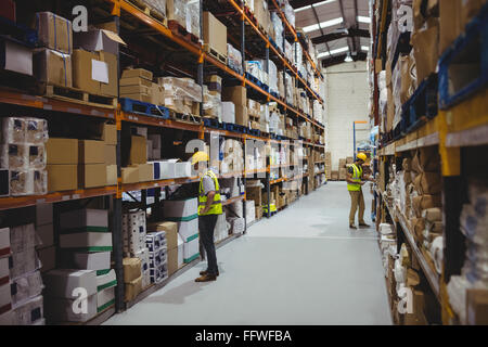 Workers in warehouse Stock Photo