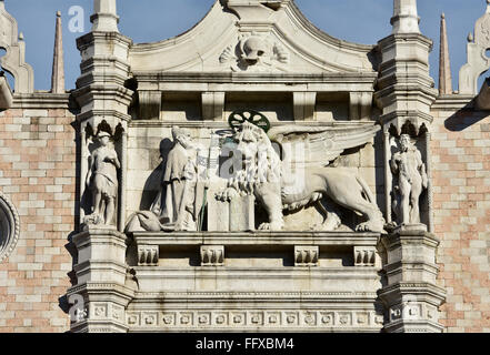 Detail of Venice Lion, Andrea Gritti Doge, Mercury and Jupiter statues from the Doge's Palace western facade in Saint Mark Squar Stock Photo