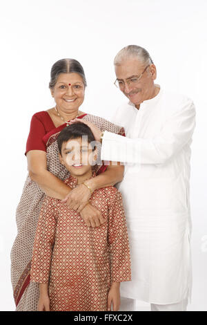 Grandfather grandmother and grandson standing MR#703N, 703P,703Q Stock Photo