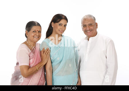 Young woman standing between old couple MR#703P,703Q,703S