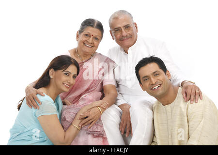 Young woman and man sitting down with old parent MR#703P,703Q,703R,703S Stock Photo