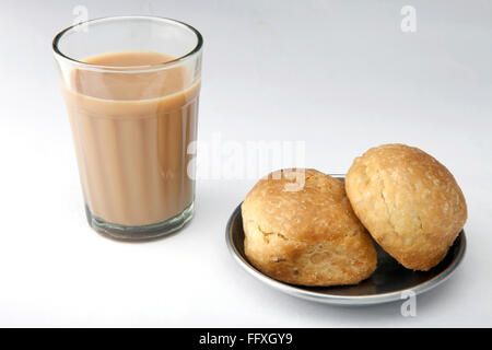 tea glass with Jeera butter India Stock Photo