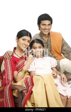 Portrait of rich Indian farmer family sitting on chair MR#743A,743B,743C Stock Photo