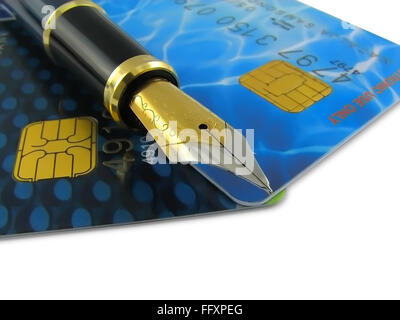 Credit cards end ink pen on white background. Stock Photo