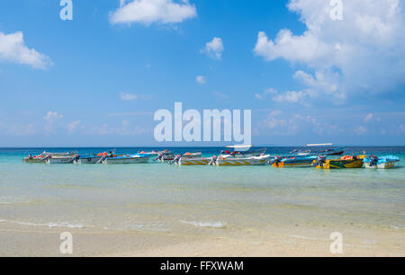 Row of colorful motor boats parked at Elephant Beach, havelock island, Andaman, India Stock Photo