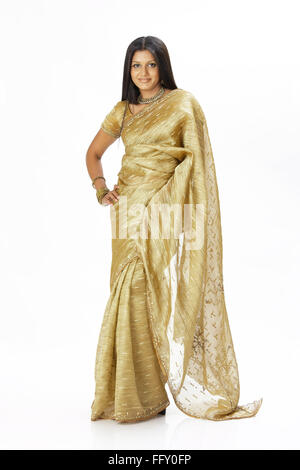 Indian lady standing in stylish pose wearing ceremonial silk sari MR#738 Stock Photo