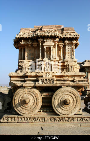 Stone chariot in front of Vijaya Vittala temple , Hampi Vijayanagar ruins , Karnataka , India Stock Photo