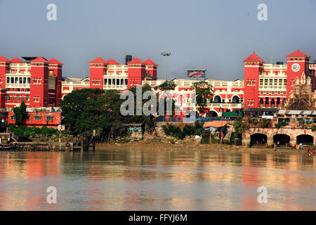 Howrah railway station beside river ganga ; Calcutta Kolkata ; West Bengal ; India 16 October 2008 Stock Photo