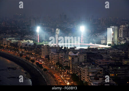 Marine Drive and Wankhede Stadium at night Bombay Mumbai Maharashtra India Asia Indian stadium floodlights stadium spotlights high-mast lights stadium Stock Photo