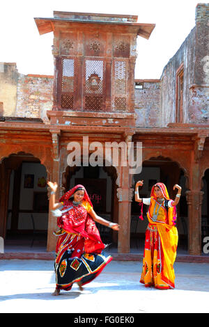 Rajasthani women performing ghoomer dance in haveli ; Rajasthan ; India MR#769D;769C Stock Photo