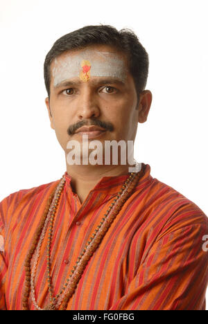 Indian man Hindu priest with beads mala garland and ash forehead, india, asia, MR#693O Stock Photo