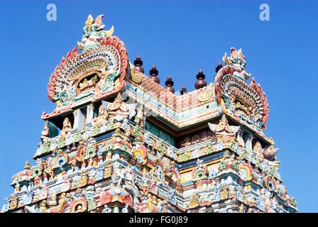 Gopuram richly decorated stucco figures impressive gateway Sri Ranganathswami temple Srirangam Tiruchirapalli Tamil Nadu Stock Photo
