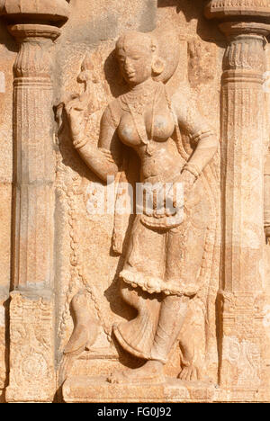 Richly carved statue beautiful woman parrot wall temple complex Sri Ranganathswami Srirangam Tiruchirapalli Tamil Nadu Stock Photo