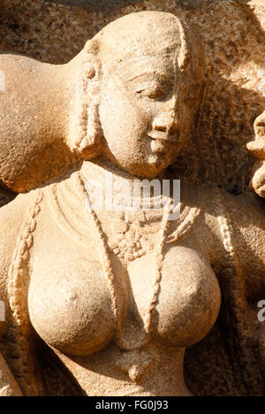 Richly carved statue beautiful Gopika milkmaid wall temple complex Sri Ranganathswami Srirangam Tiruchirapalli Tamil Nadu Stock Photo